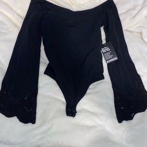 Black express bodysuit with lace sleeve